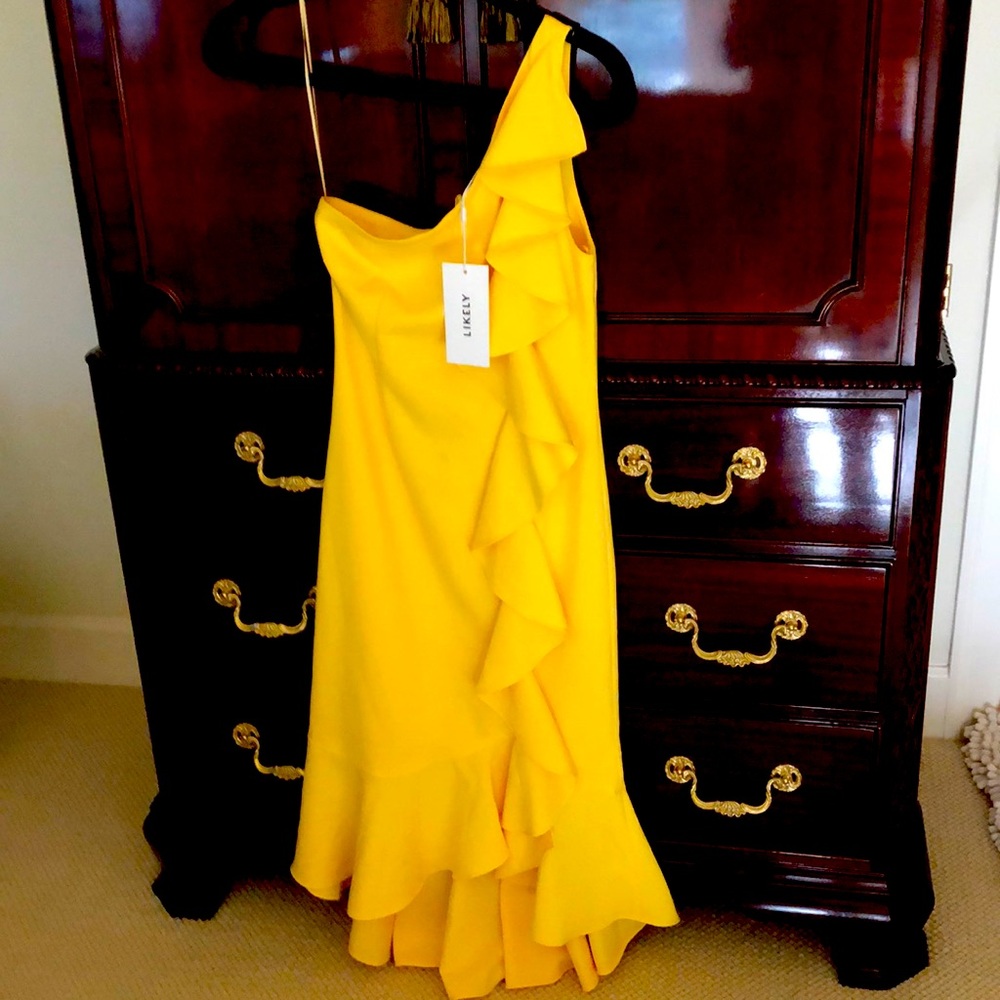 Likely yellow dress
